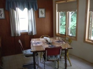 Photo of Dinner table looking over the waterfront.