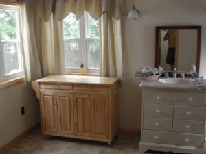 Photo of large powder room.